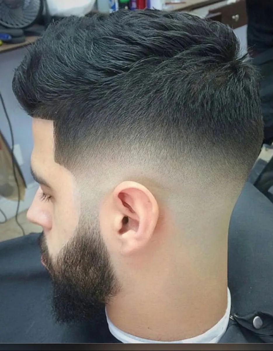 Big Apple Barbers, hair salon at 422 East 14th Street in Manhattan, New York