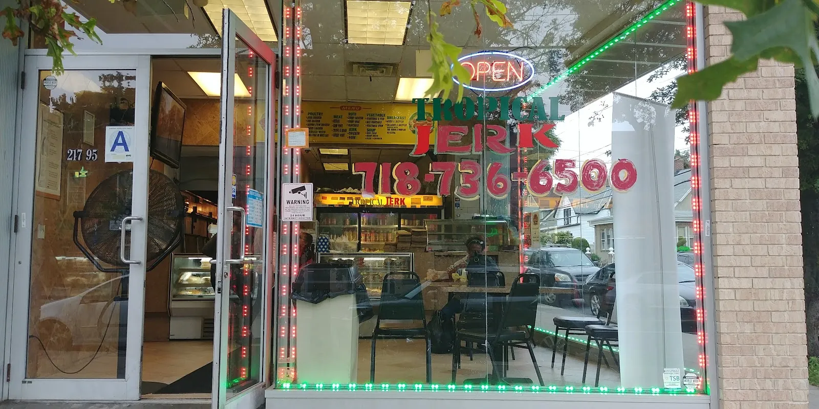 E & J Tropical Jerk & Seafood, caribbean kitchen at 217-95 Hempstead Avenue in Queens, New York