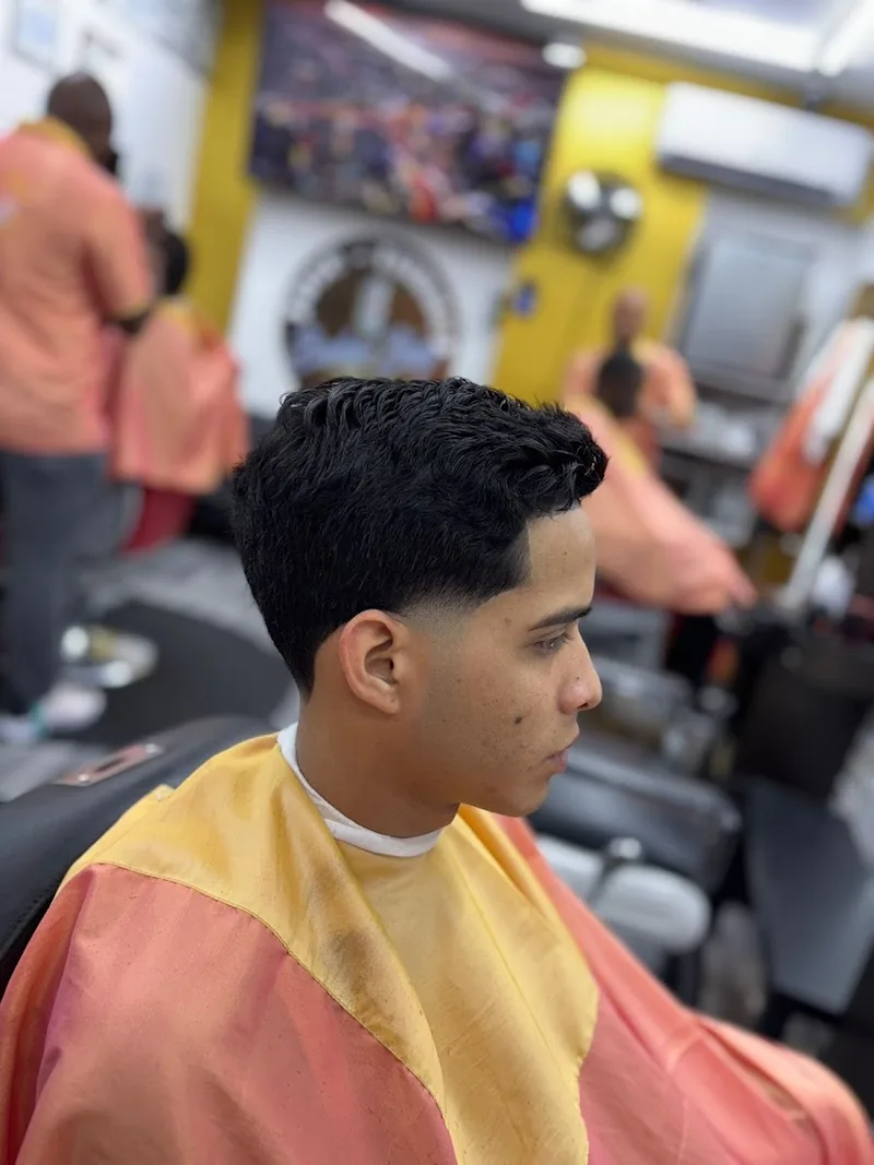 José-Ismael Barber Shop, hair salon at 2587 Broadway in Manhattan, New York
