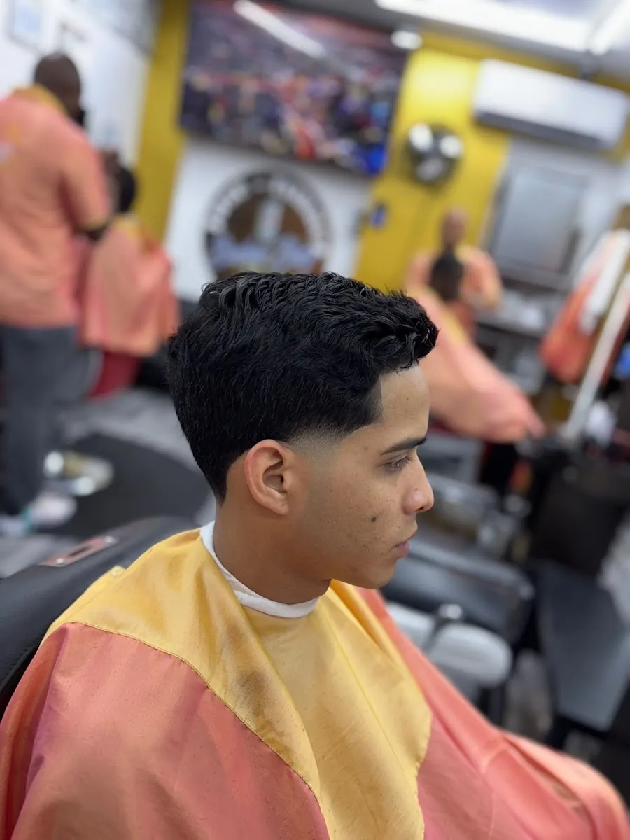 José-Ismael Barber Shop, hair salon at 2587 Broadway in Manhattan, New York