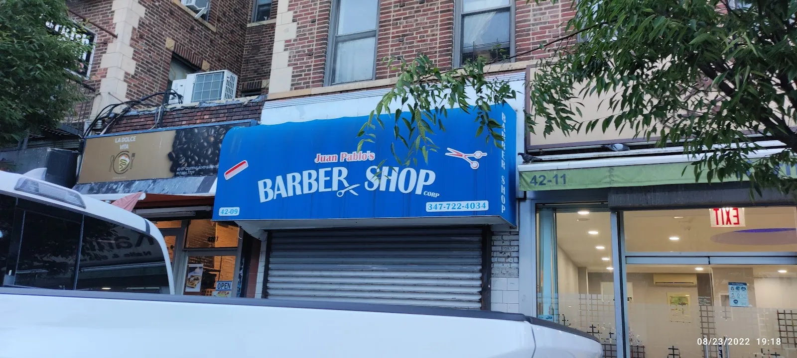 Juan Pablo's Barber Shop, hair salon at 42-09 Queens Boulevard in Queens, New York