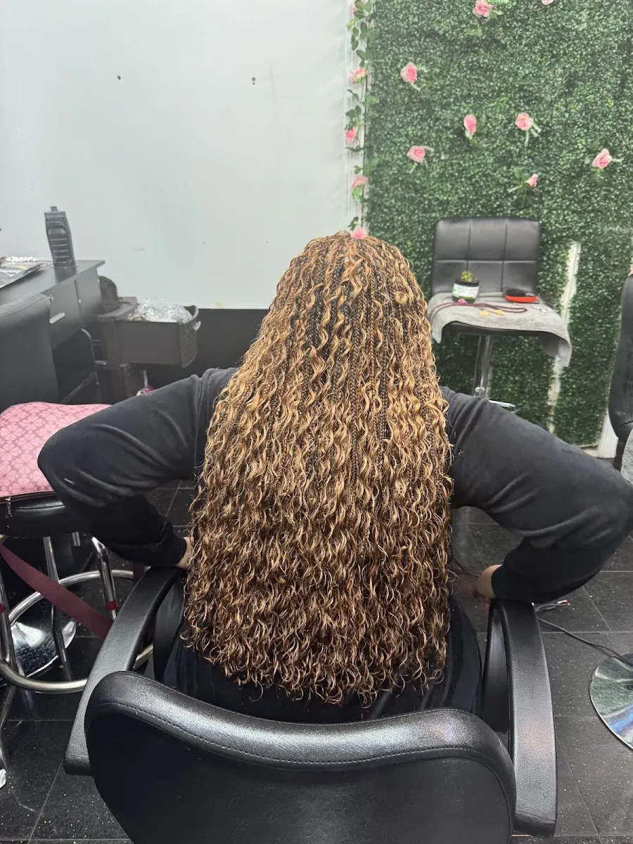 Little Senegal Hair Braiding, hair salon at 2166 Frederick Douglass Boulevard in Manhattan, New York