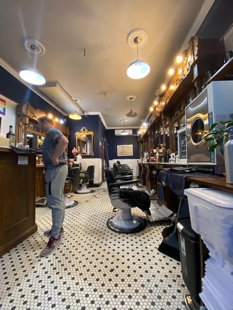 Neighborhood Cut & Shave, hair salon at 37A Bedford Street in Manhattan, New York