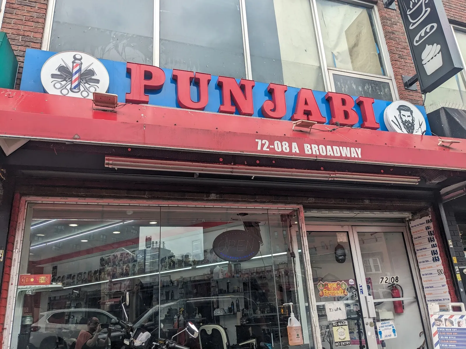 Punjabi Unisex Barber Shop, hair salon at 72-08A Broadway in Queens, New York