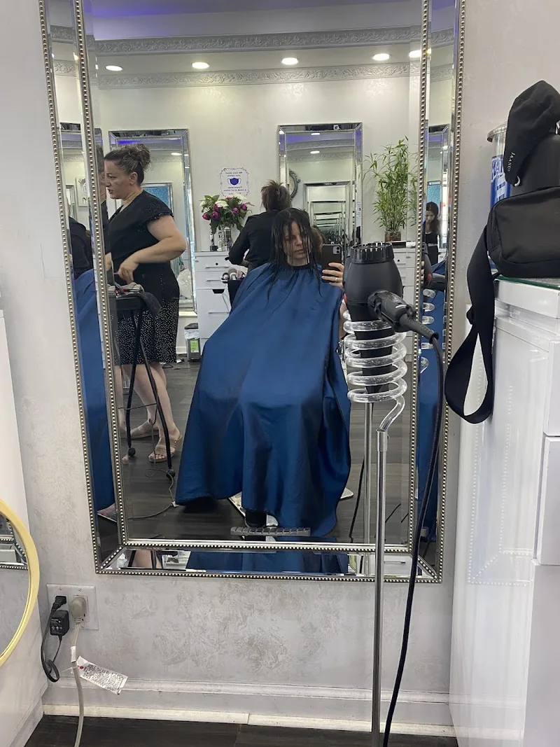 RIta's Unisex Salon & Spa, hair salon at 96-58 Queens Boulevard in Queens, New York