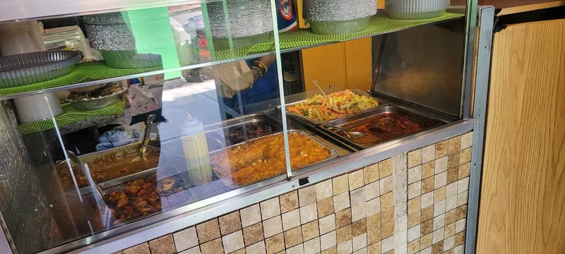 T & J Jamaican Flava, caribbean kitchen at 1257 Park Avenue in Manhattan, New York