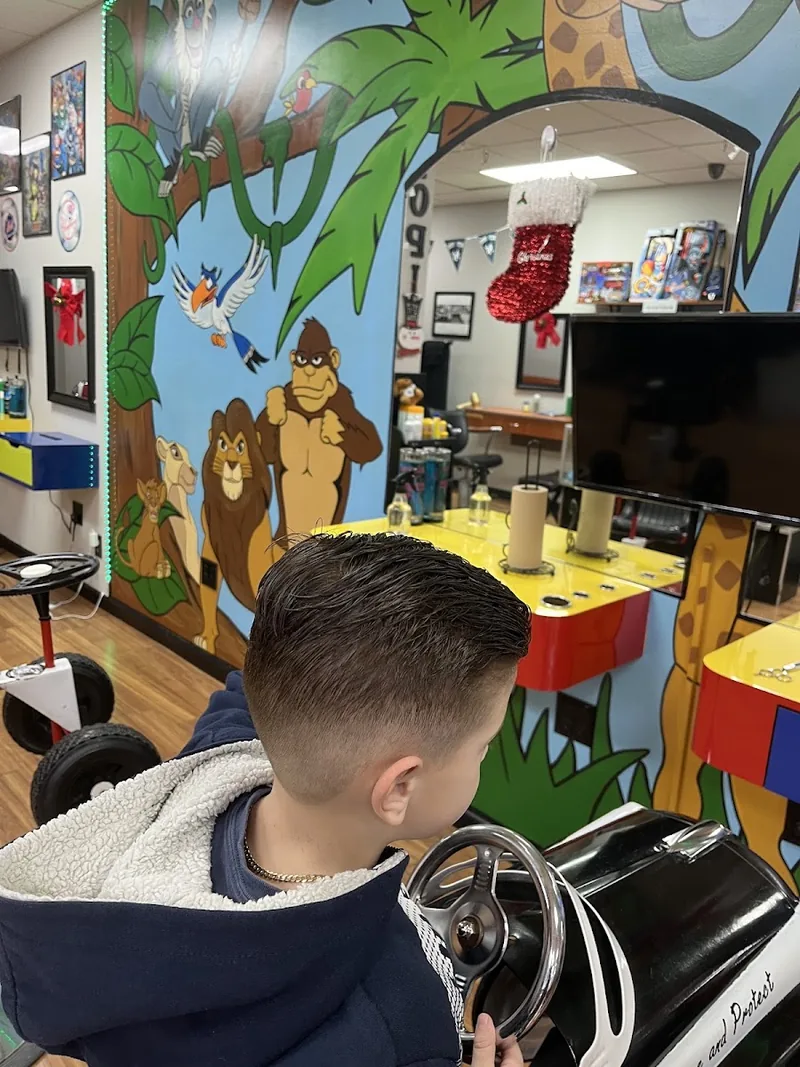 Utopia Barber Shop, hair salon at 20-06 Utopia Parkway in Queens, New York